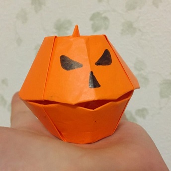 jack o'lantern formed with origami paper