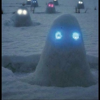 snow blobs at night with glowstick eyes