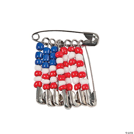 American flag made of saftery pins threaded with red white & blue beads
