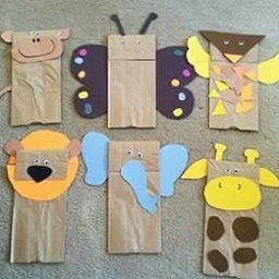 Paper bag puppets of pig, butterfly, owl, lion, elephant and giraffe