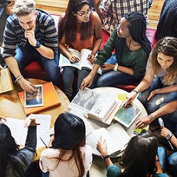 teens sitting in circle planning activities