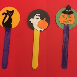 halloween-themed bookmarks made from craft sticks and construction paper