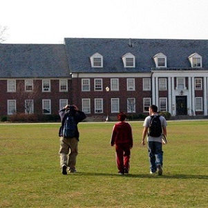 college students walking across a campus