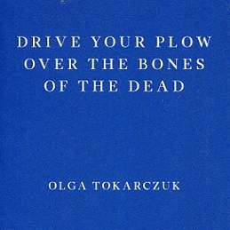 Plain blue book jacket with white letters Drive Your Plow Over the Bones of the Dead