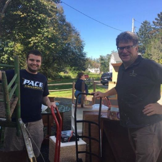 men accepting furniture donations