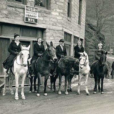 1920s era photo of librarians on horses