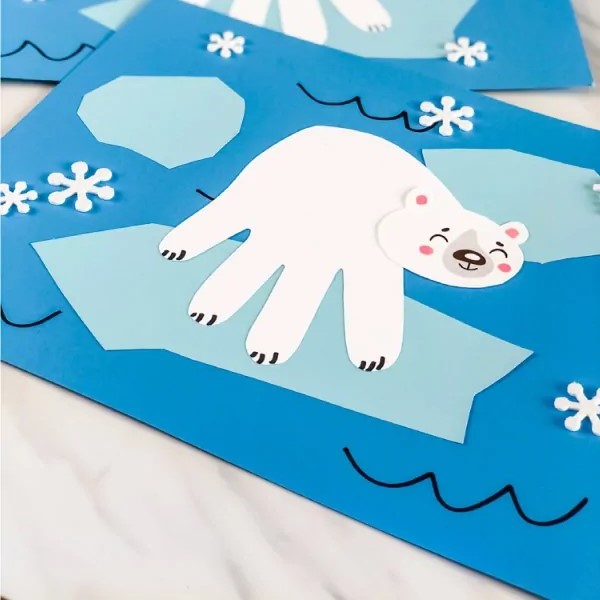 polar bear made from hand traced on white paper and glued to blue construction paper