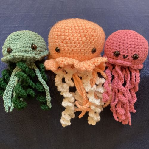 crocheted jellyfish, green orange and pink