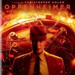 man in 1940's suit with atomic bomb behind him and word Oppenheimer above him