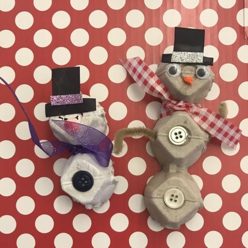 snowmen made from egg cartons, bits of fabric and buttons
