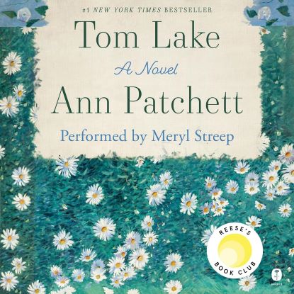 book cover of daisies in a filed with the title Tom Lake above them