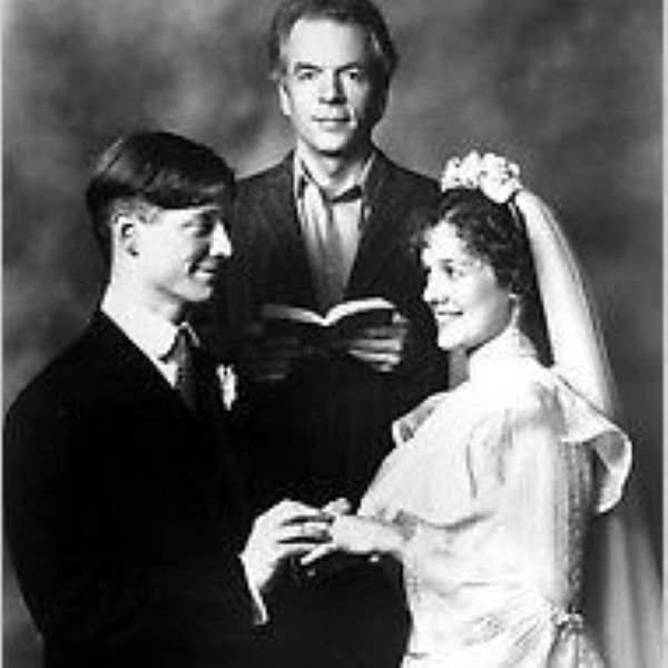 black and white photo of couple being married by justice of peace