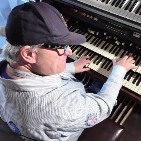 Man playing the organ at Yankee Stadium