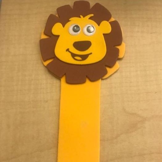 bookmark of yellow lion with googly eyes
