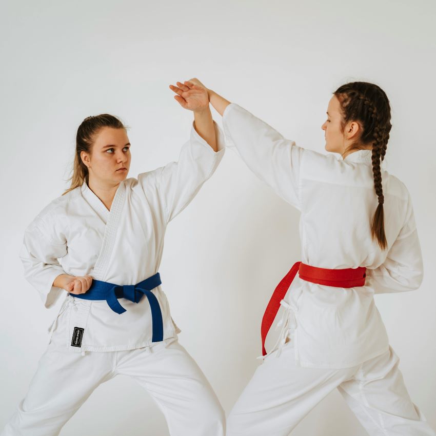 two girls doing karate
