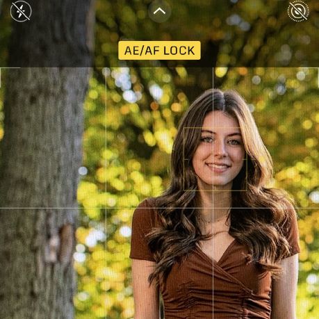 woman viewed through iPhone camera with photo options hightlighted