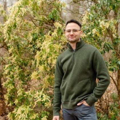 Man standing in woods