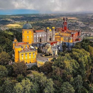 colorful palace in the hills of portugal