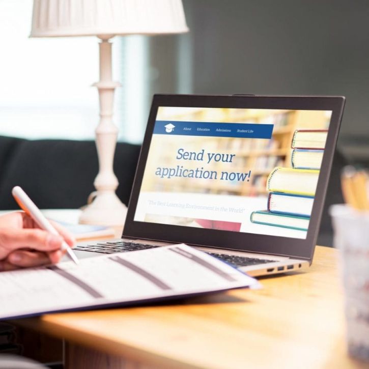 open laptop with wording "Send your application now!"