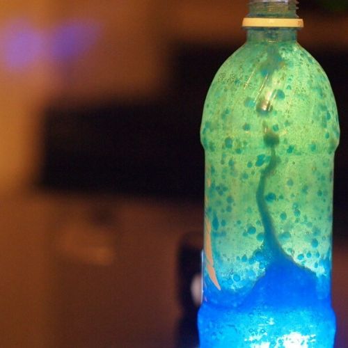 water bottle turned into a lava lamp using water, oil and Alka Seltzer tabs.