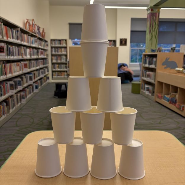 tower of white paper cups