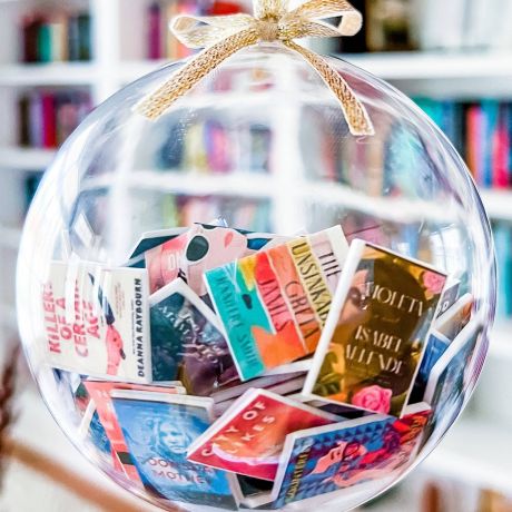 glass ornament with tiny books inside