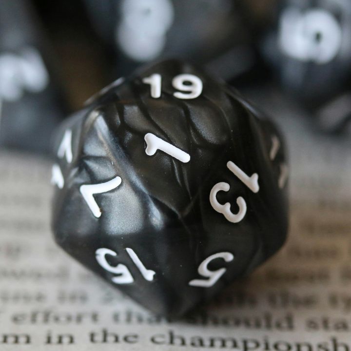 black Dungeons and Dragons multi-sided die