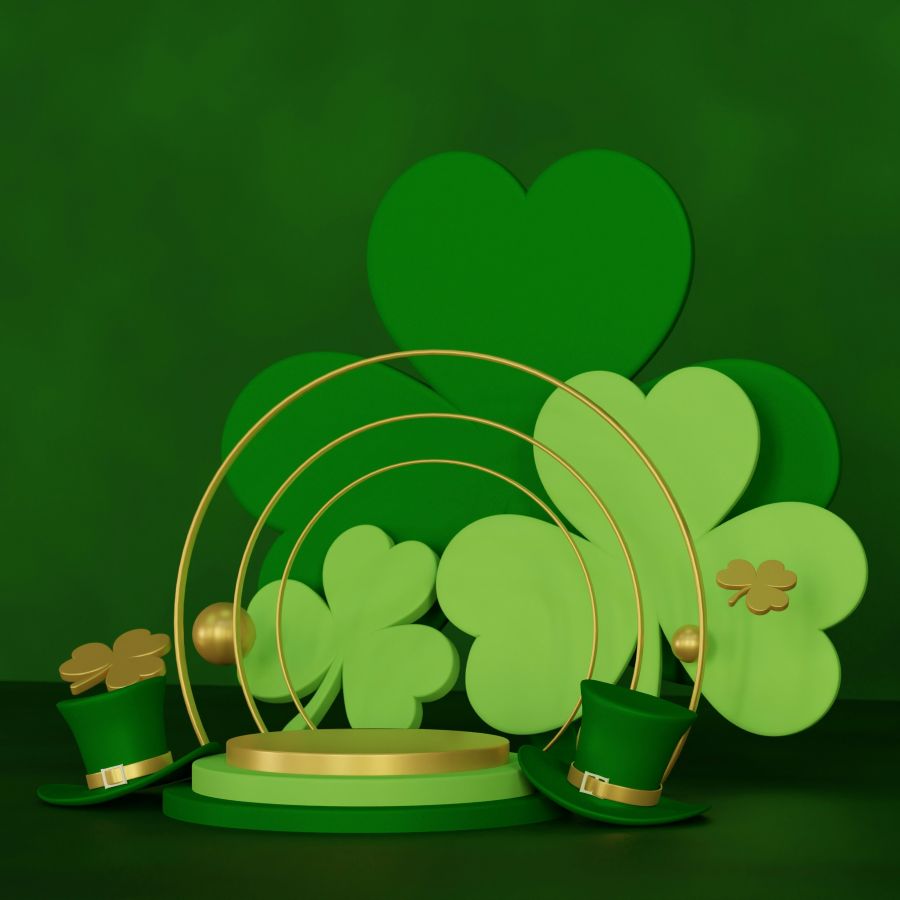 centerpiece featuring 3 large green foam shamrocks and two tiny green leprechaun hats