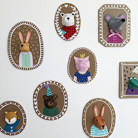 3D Animal Portraits made from paper and cardboard, hanging on a wall