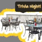 glass tables on patio beneath words Trivia Night!