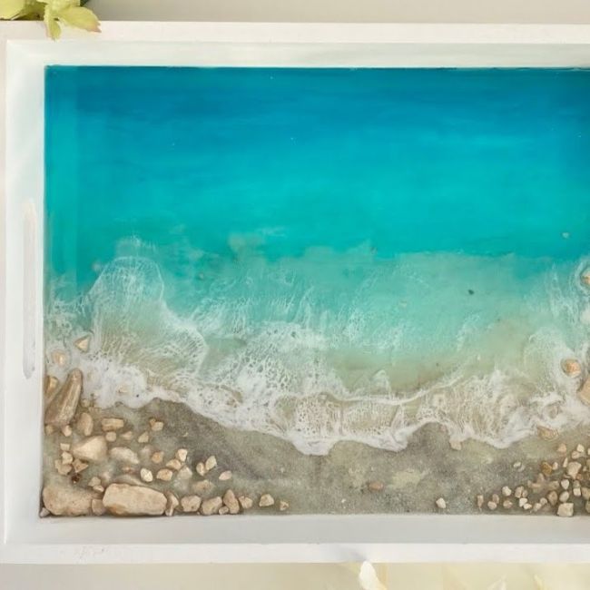 wooden tray with ocean beach scene on it