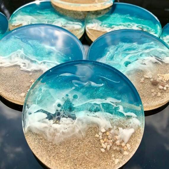 Multiple round trays resembling waves on a beach.