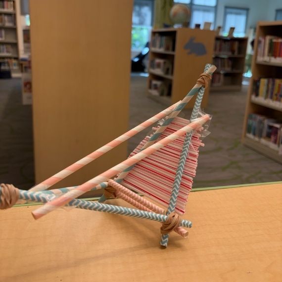 A small boat made of straws