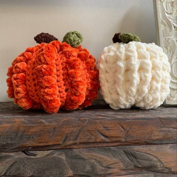 Two crocheted pumpkins