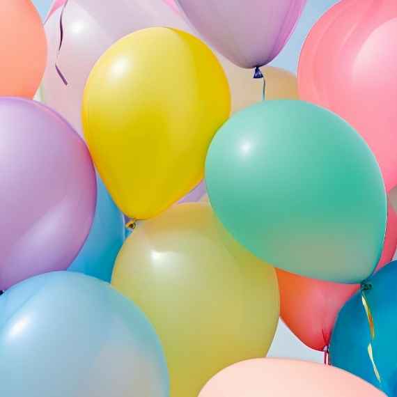 Many inflated balloons in various colours together