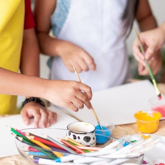 Children painting together